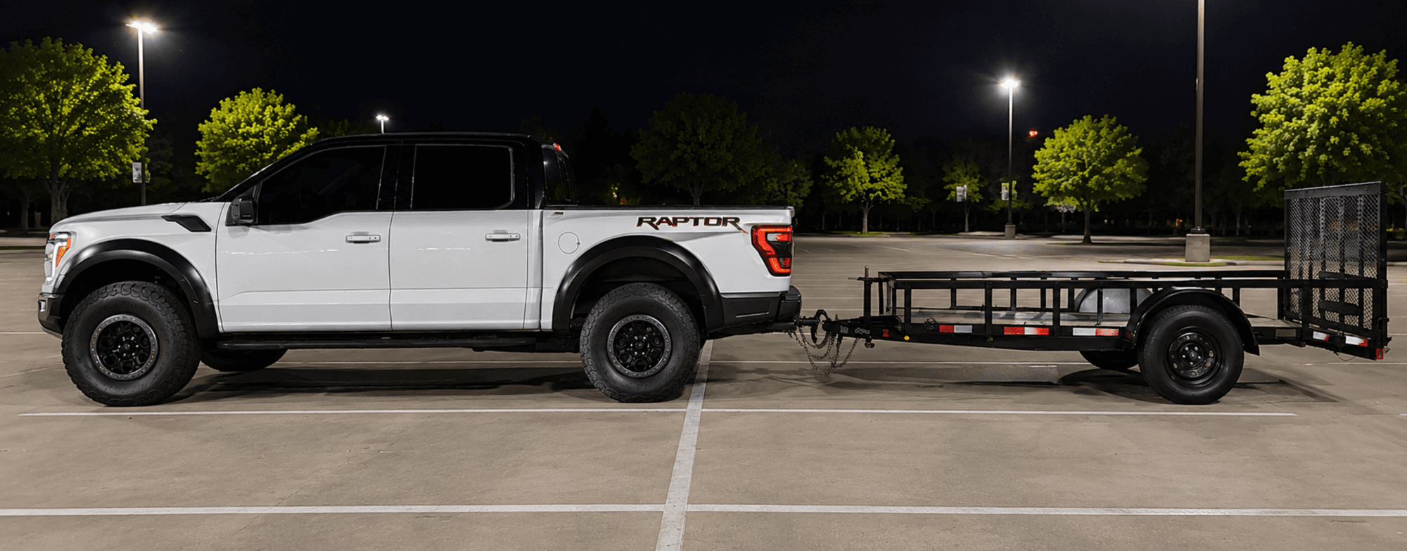 DFW Student Crew Ford F-150 truck with 6x12 utility trailer ready for a garage cleanout and junk hauling job in Arlington, Texas